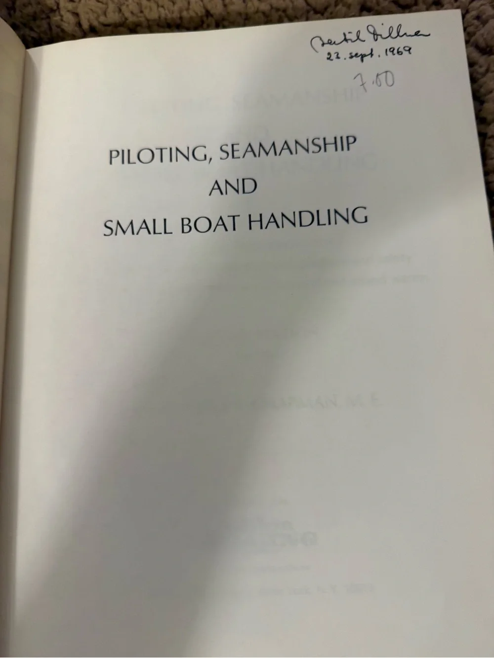 Piloting seamanship & small boat handling hardcover book writing on front page